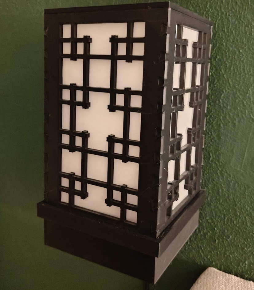 Wall-mounted Japanese inspired lamp